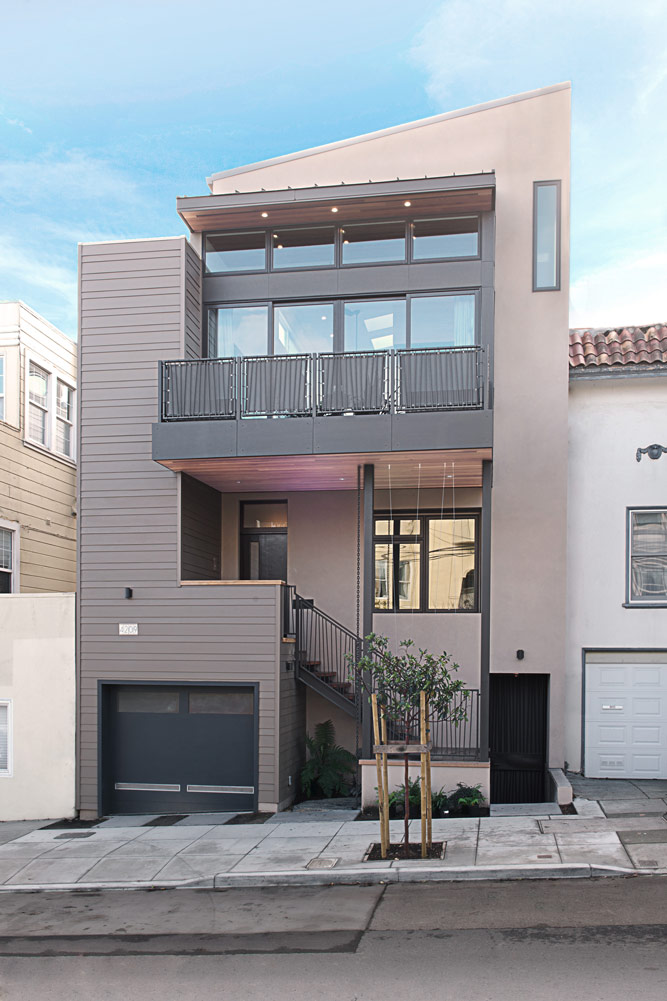 modern home renovation front facade with balcony and tree in noe valley