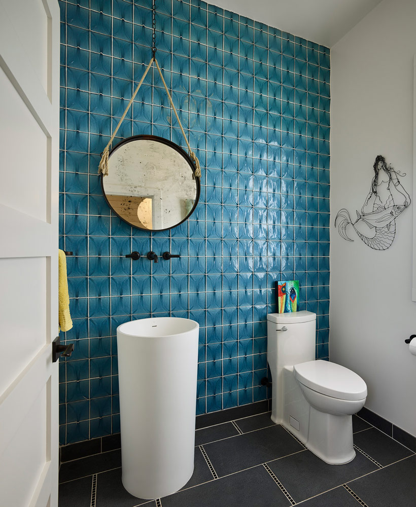 white residential modern bathroom with blue tile