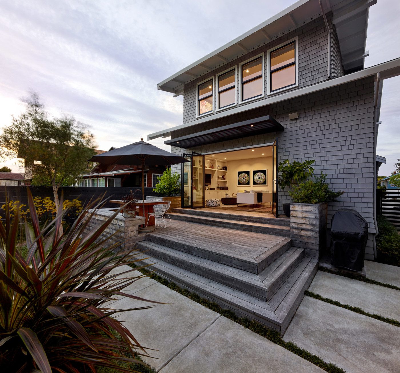 grey modern craftsman home exterior with deck in Alameda