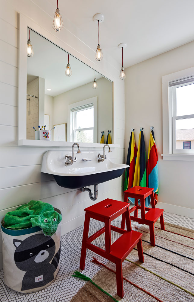 red stools in children's bathroom renovation in craftsman