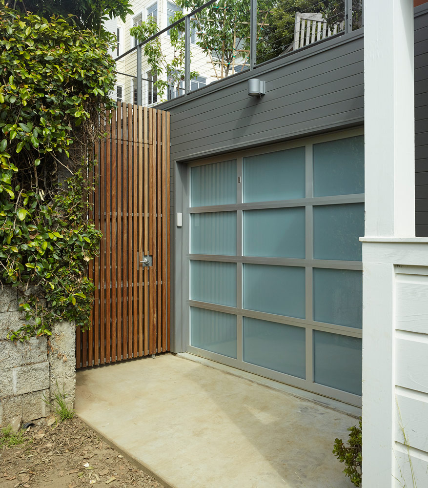 grey and metal garage door modern home remodel in california