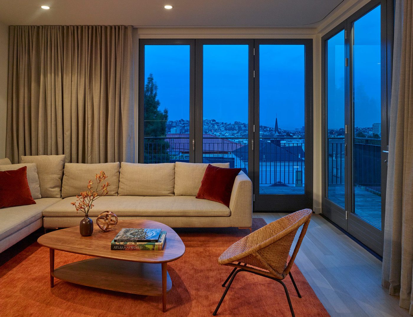 modern living room at dusk with view of san francisco