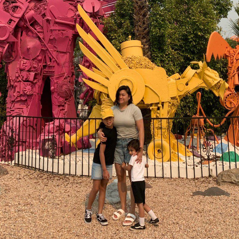 Le Klein at a playground with her children