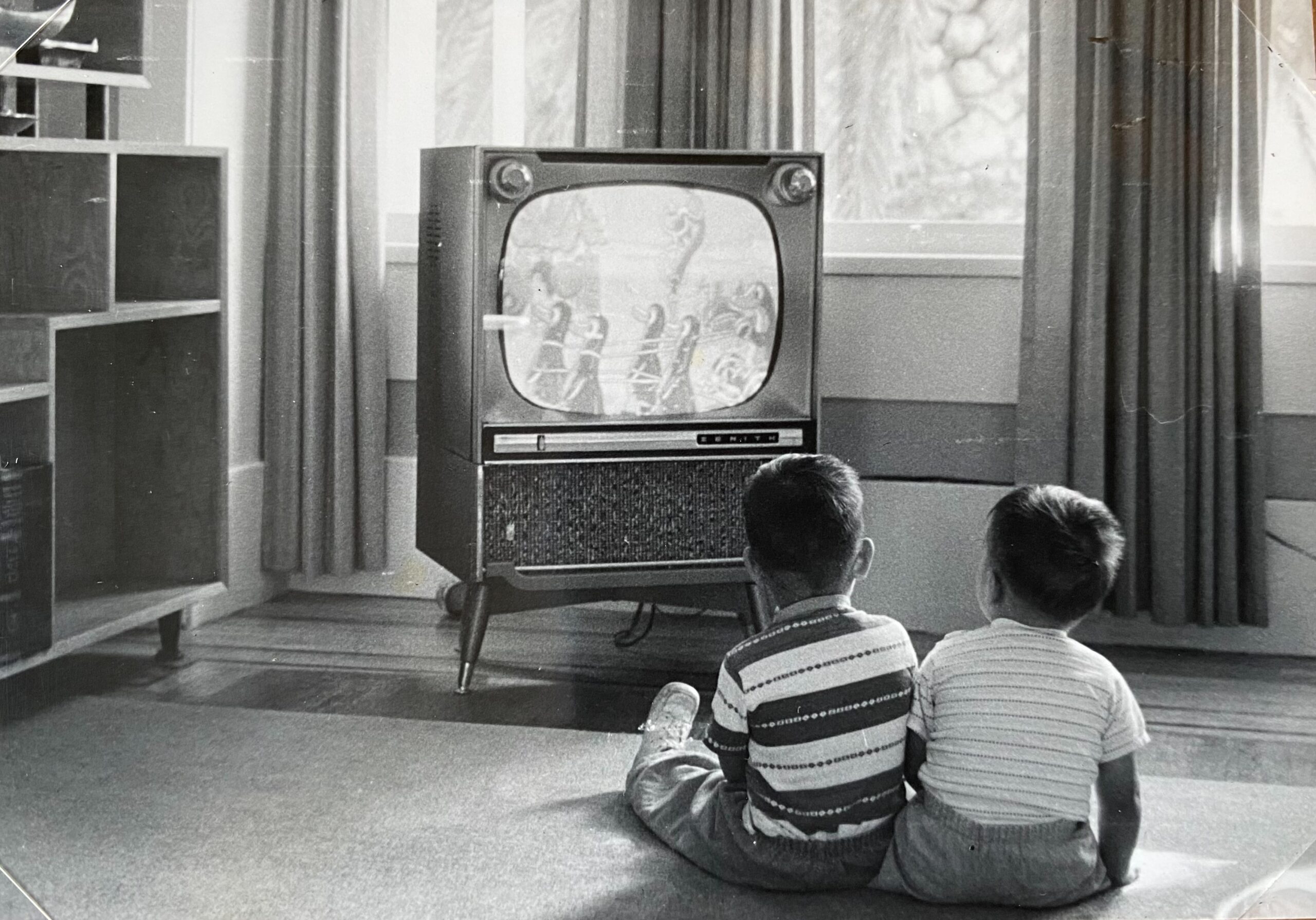 San Francisco Childhood home two children watching TV