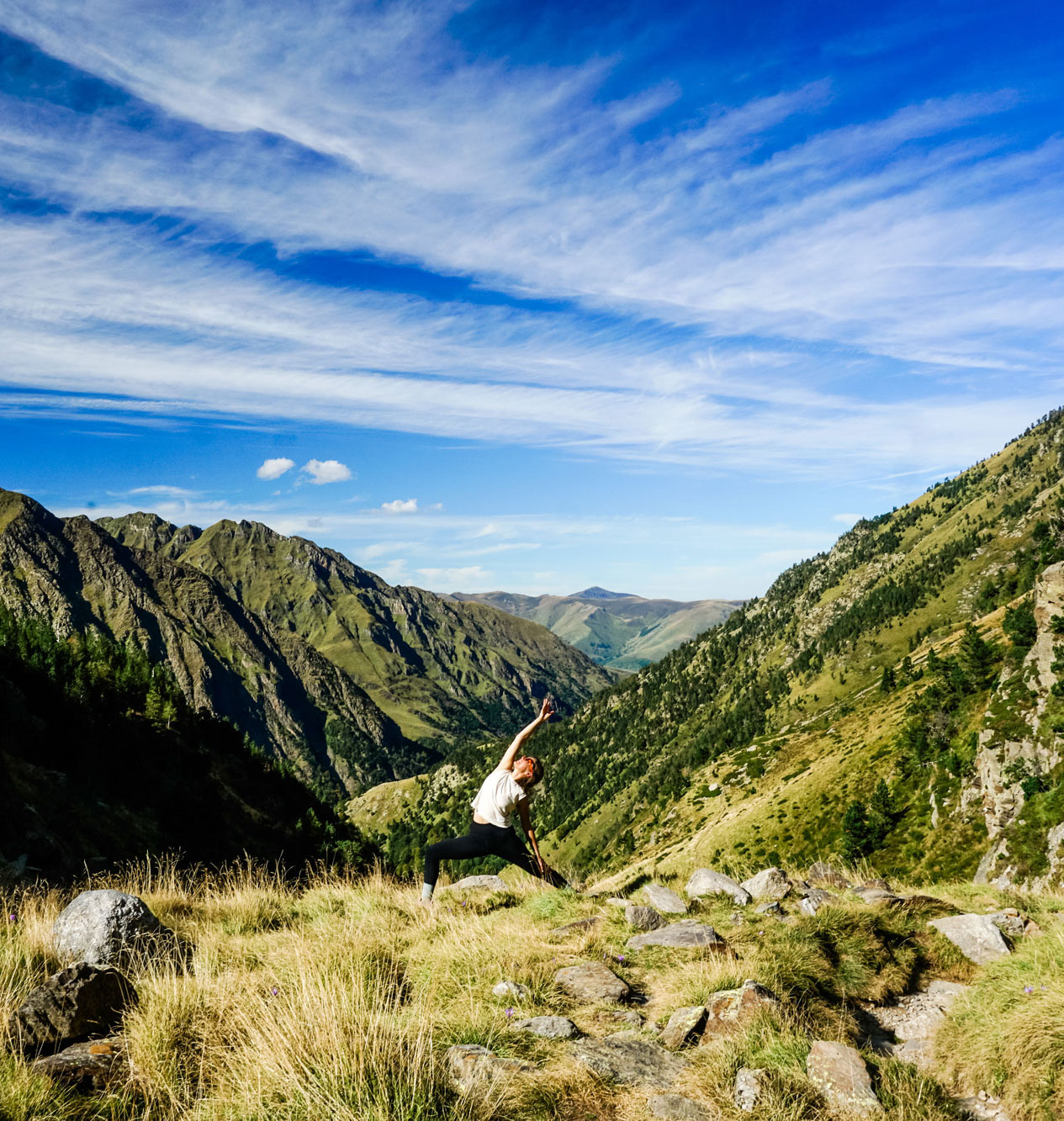woman doing yoga in the mountains