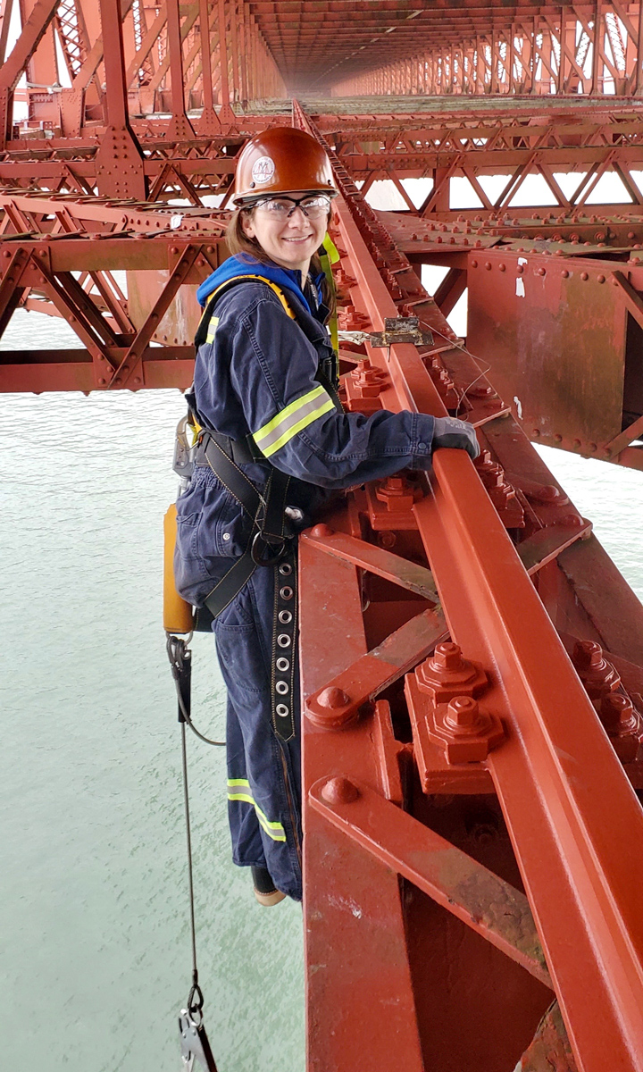 Vanessa Leedy working on Golden Gate Bridge in harness