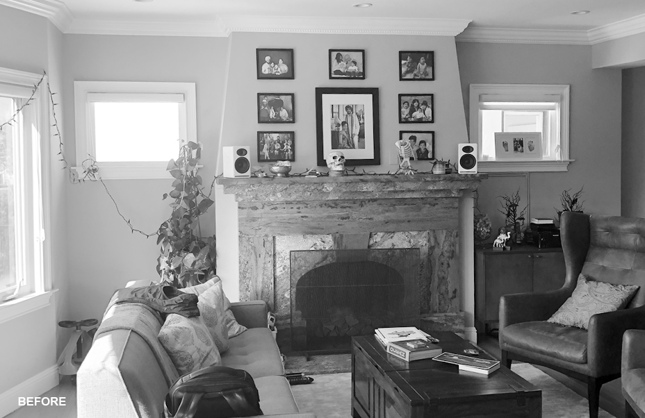 Black and white Before image of remodel of living room and fireplace