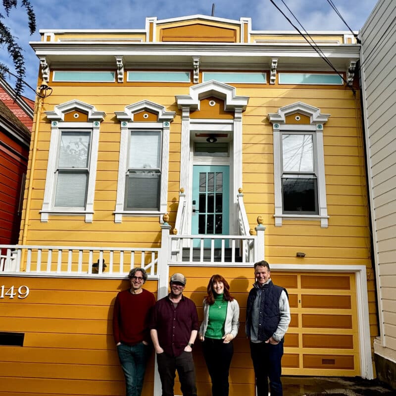 President of AT6 Architecture + Design Build Jason Langkammerer and clients stand outside of their historic San Francisco Victorian home he and his team have fully remodeled inside.