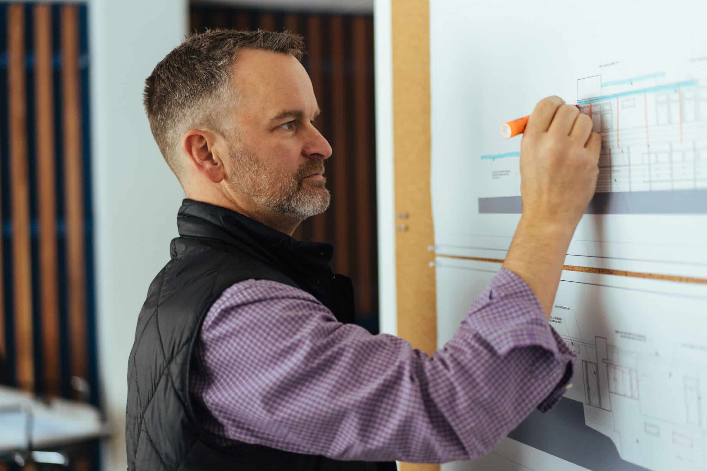 Jason Langkammerer the President of AT6 Architecture + Design Build working in his San Francisco office.